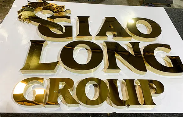 Mẫu Bảng Hiệu Alu Chữ Nổi Inox Vàng Gương Đẹp Năm 2026