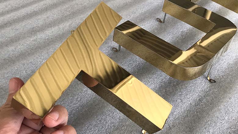 Gia công chữ inox vàng