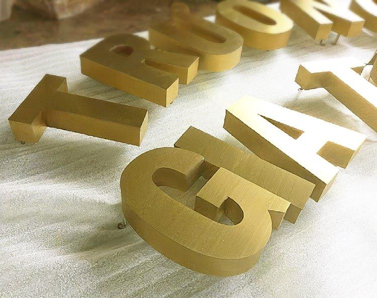 Gia công chữ inox vàng